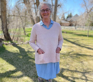 Ann Budd models Alita, a top down set in sleeve pullover designed during class!