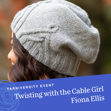 Load image into Gallery viewer, A photo of the Geneva Hat, a design by Fiona Ellis, with lovely cables at the front. The banner at the bottom reads: Twisting with the Cable Girl, Fiona Ellis, Yarniversity Event.