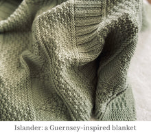 Load image into Gallery viewer, A photo of the corner of a cozy blanket. The blanket pattern is called Islander and is from the book, Newfoundland Knits for Little Ones by Katie Noseworthy.
