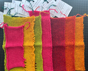 Examples of different cast on techniques in bright cheerful colours