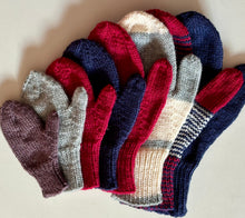 Load image into Gallery viewer, An array of mittens, one in each of the eight sizes included in the pattern.