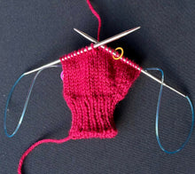Load image into Gallery viewer, A Magic Loop Mitten, particially knit, showing the magic loop style.