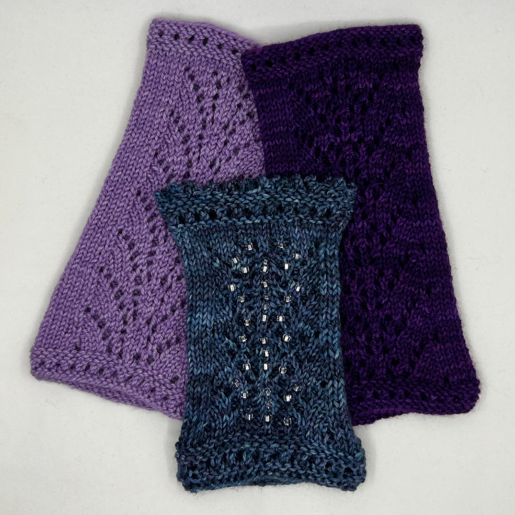 A trio of Queen Vicki's Wristlets in three colours. One with beads, two without.