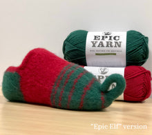 Load image into Gallery viewer, An image of our Fuzzy Foot Sock in a red and green &quot;elf&quot; inspired look.