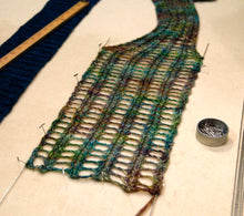 Load image into Gallery viewer, An image of a lace scarf, blocking.