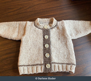 Baby sweater knit by Darlene Sluder 
