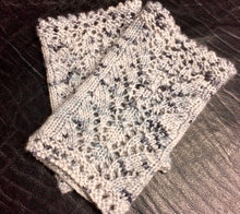 Load image into Gallery viewer, A pair of Queen Vicki&#39;s wristlets in a lovely variegated yarn.