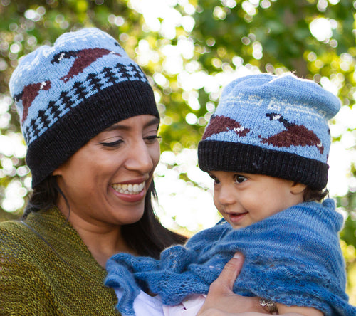 A mom and a daughter wearing Little Goose Tuques