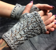 Load image into Gallery viewer, A pair of hands wearing Snow Queen Wristlets in grey